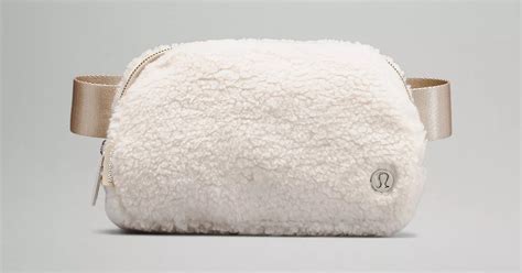 lululemon fuzzy white belt bag.